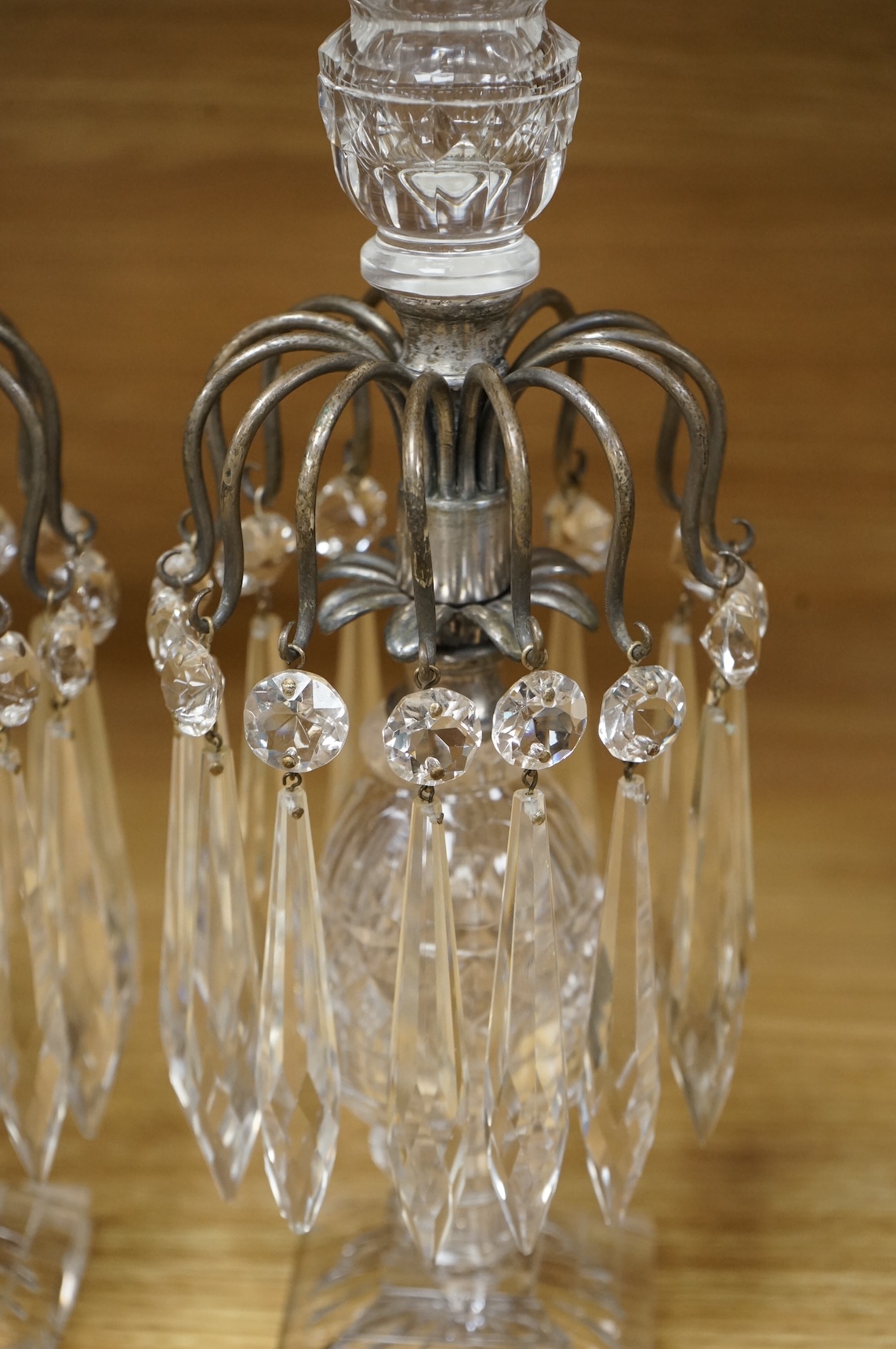 A pair of Victorian cut glass table lustres, probably Berry & Co., in Regency style, converted for electricity, 29cm high